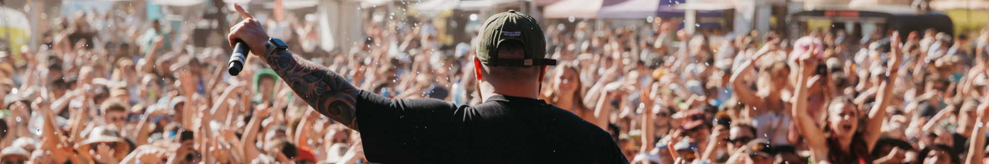 Male singer looking out at crowd Male singer looking out at crowd